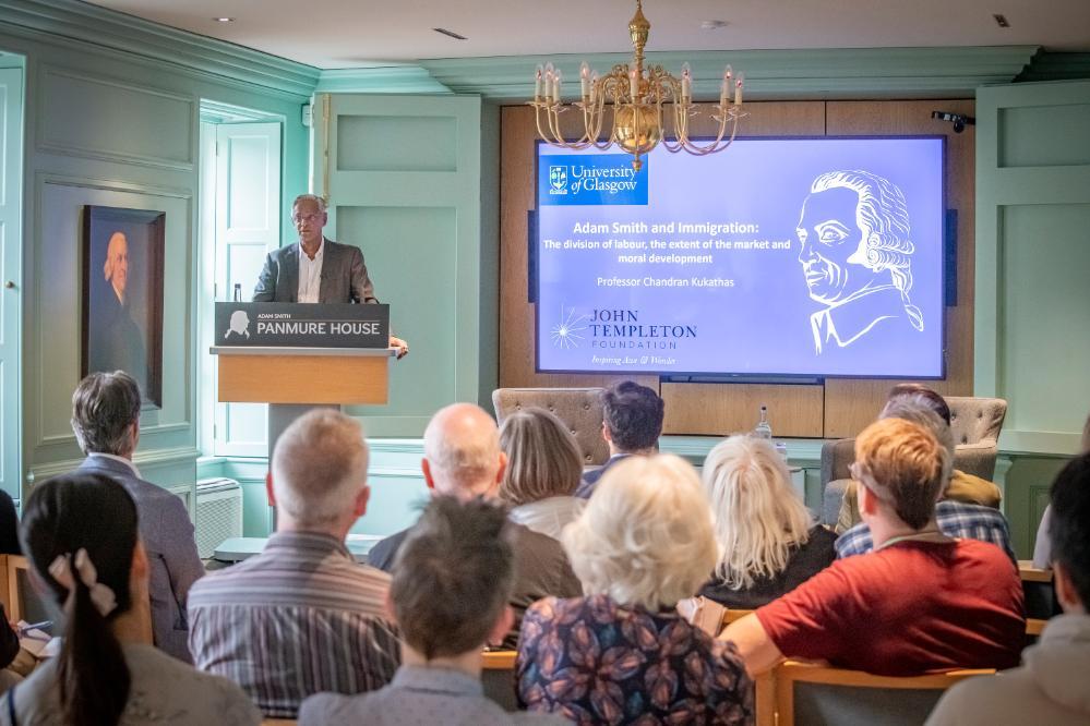 Chandran Kukathas speaking to a crowd with a podium in front of him. Source; Charlotte Morris