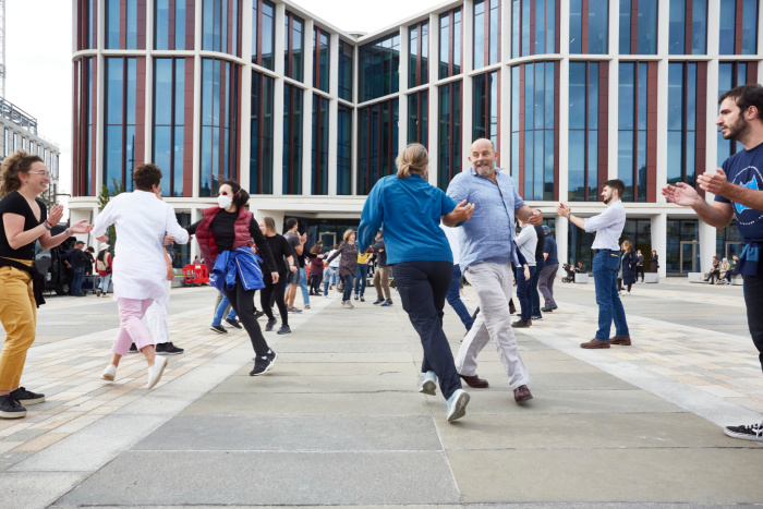 Ceilidh dancers dance outside the ARC