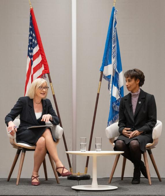 Sara and Cecilia speaking with the USA flag and the Scottish flag behind them Source: Charlotte Morris