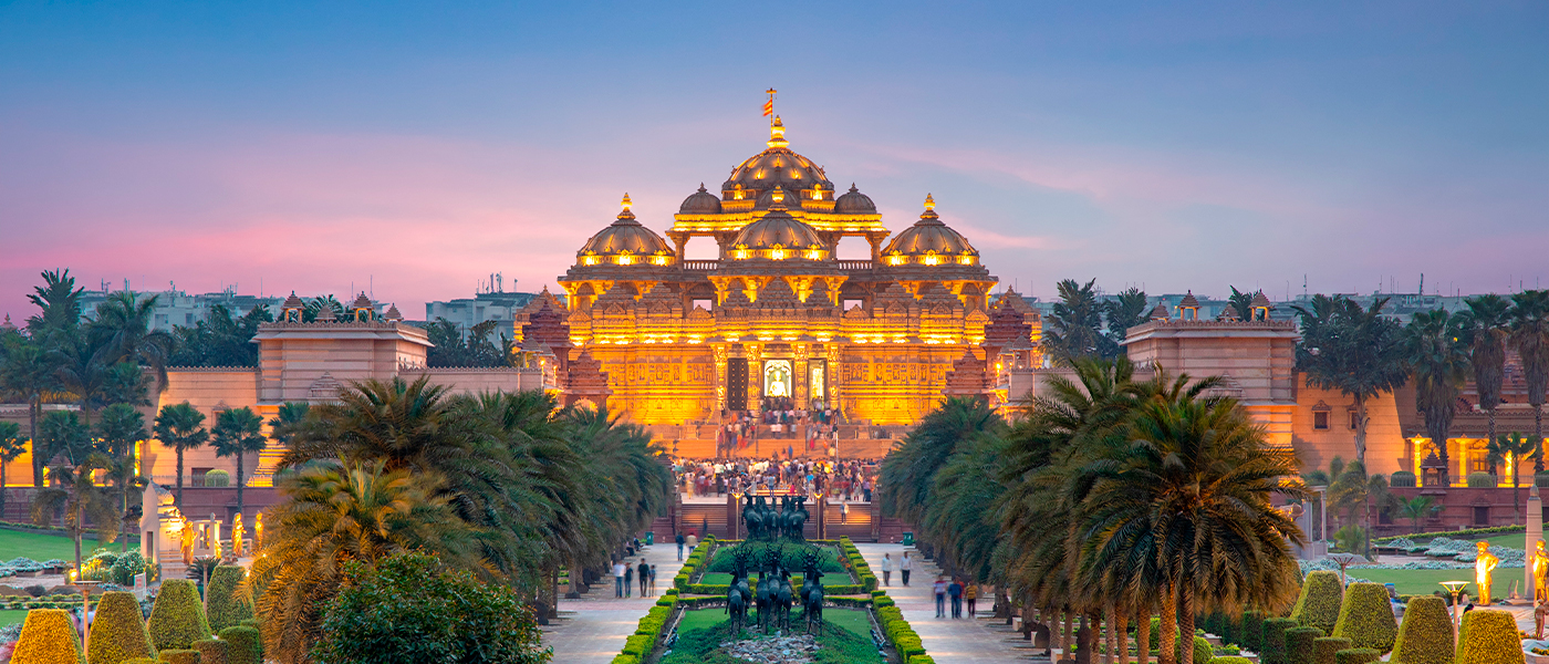 The Akshardham temple in Delhi lit up in the evening