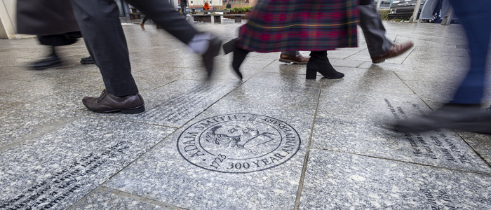 People walking over the Adam Smith Memorial paving stone Source: Charlotte Morris.