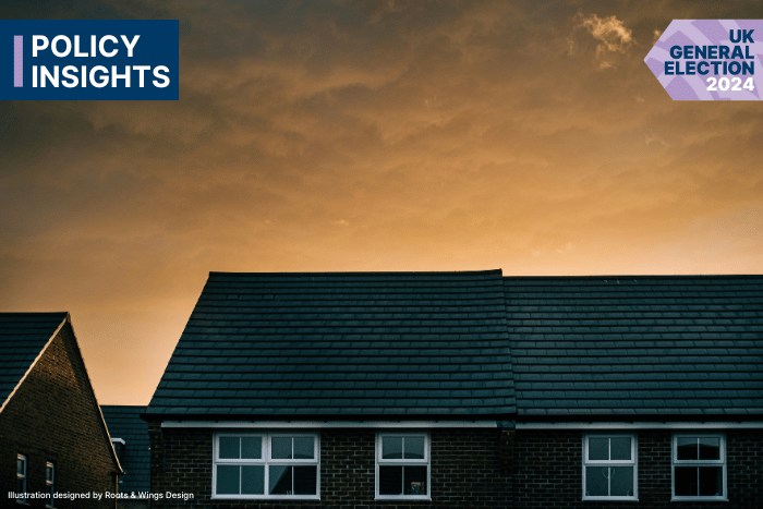 A photo of houses against a sunset backdrop