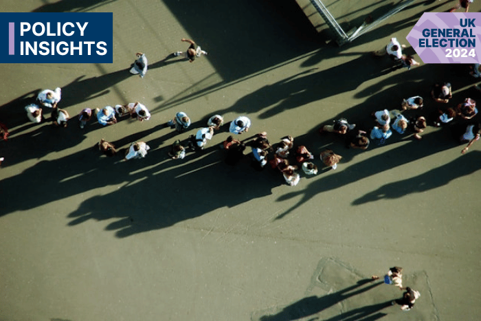 An arial photo of people forming a queue