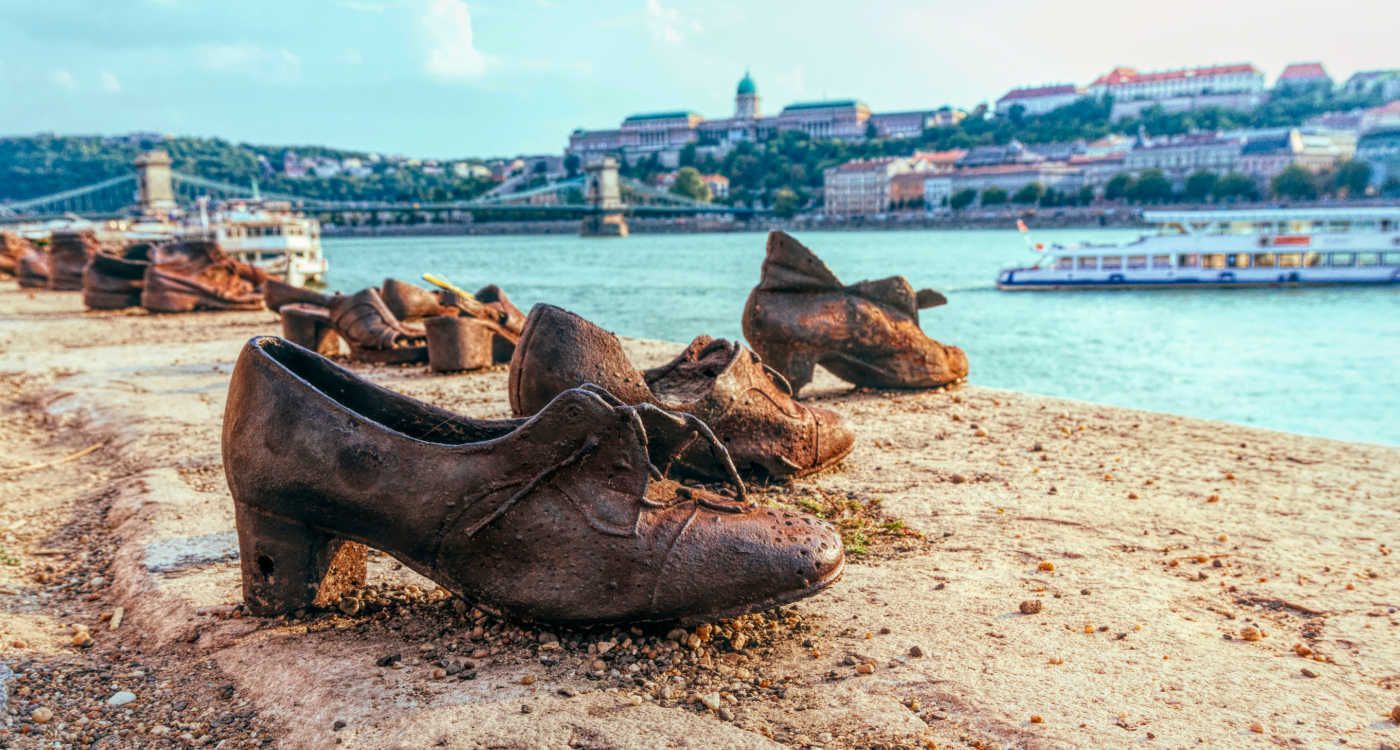 Old metal rusty shoes on the parapet of the Danube river embankment [Photo: Shutterstock]