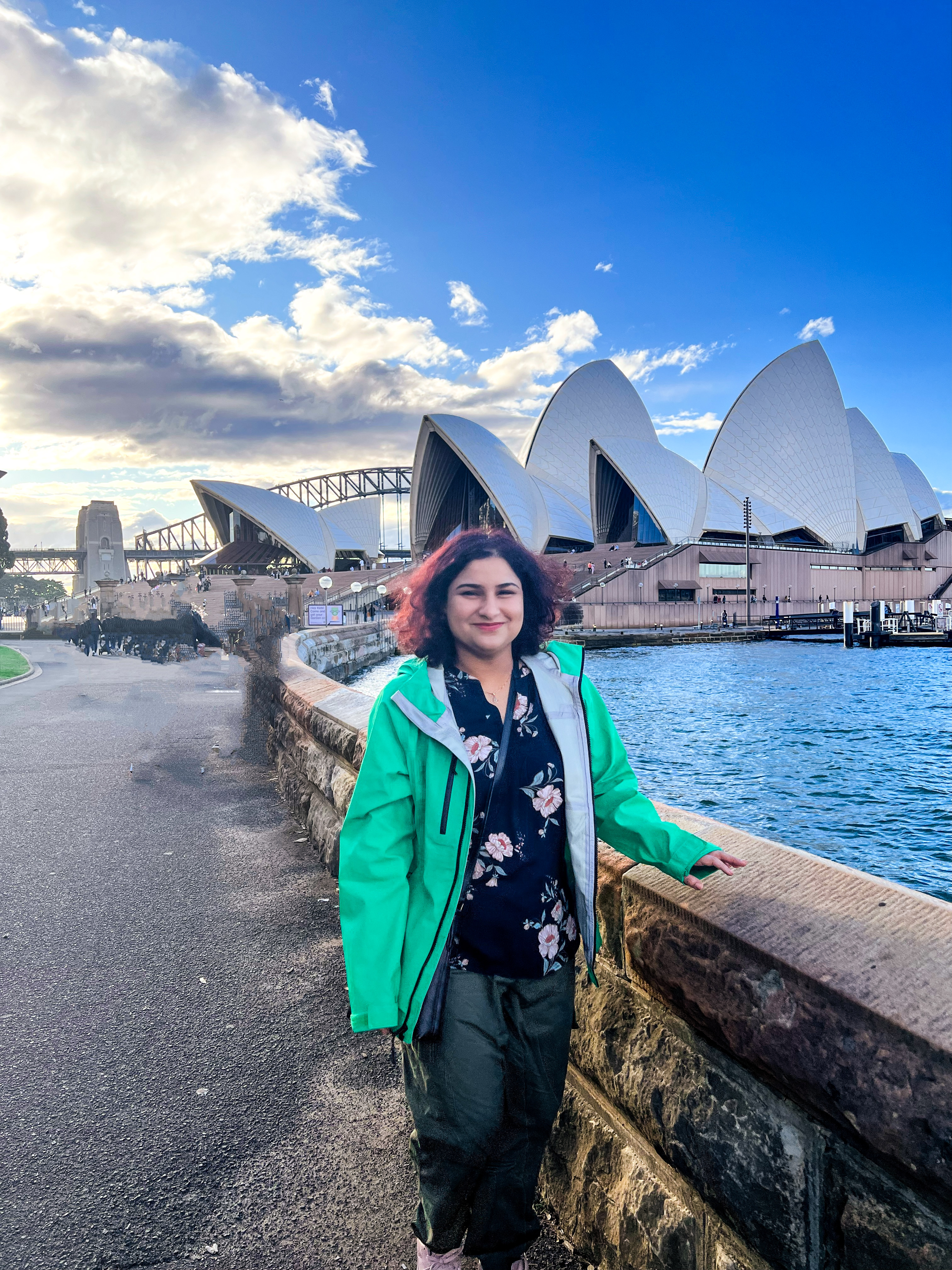 Naaz Sibia standing in front of the Sydney Opera House