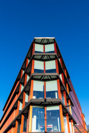 A picture of the Clarice Pears Health and Wellbeing Building against a blue sky