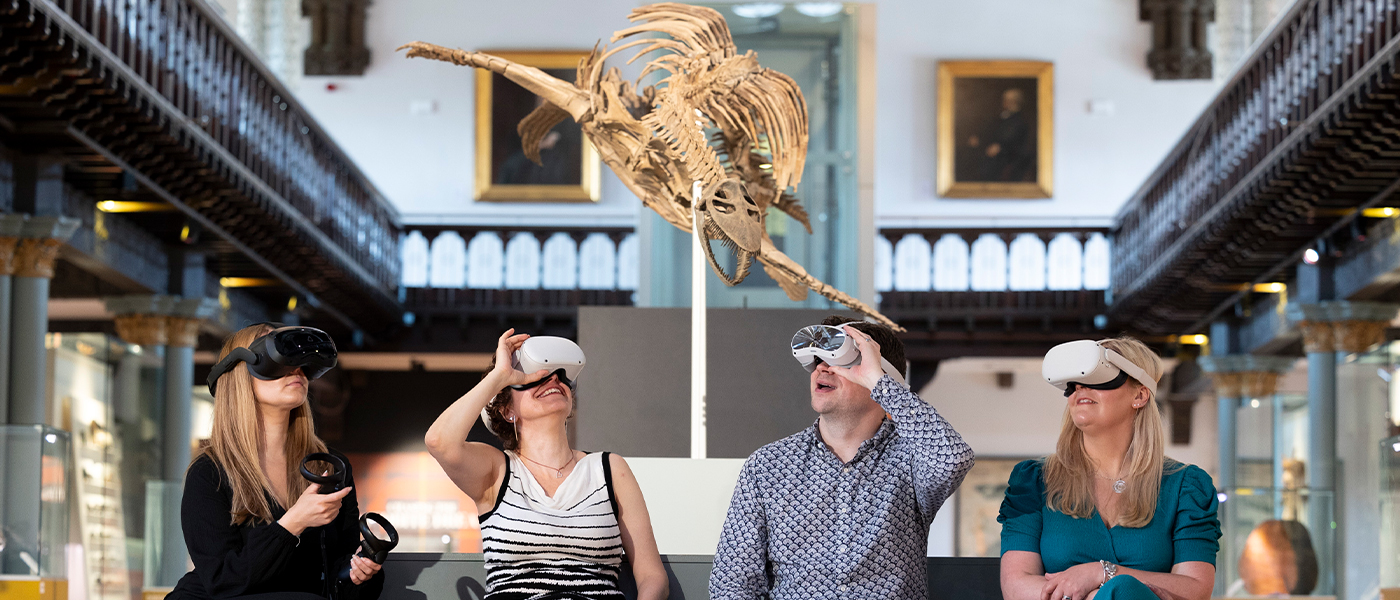 Academics in the Hiunterian Museum wearing virtual reality headsets