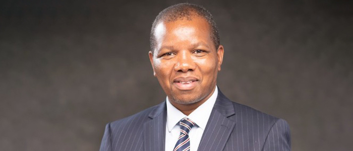 Smiling headshot of Dr Mawpatsa Mipando