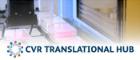 Robot multipipette moving plates containing pink liquid.