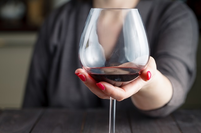 Woman holding a glass of wine