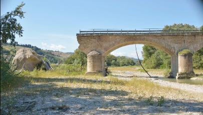 Remains of stone bridge affected by flooding