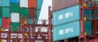 Many shipping containers on top of each other at a docks including several labelled China Shipping. Image credit: Sybille Reuter | iStockphoto https://www.istockphoto.com/photo/cargo-containers-at-a-commercial-dock-terminal-at-hamburg-harbor-germany-gm1222255550-358595066 