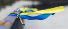 Ribbons in the colors of the national flag of Ukraine - blue and yellow - tied to a handrail. Source: Serhii Ivashchuk | iStockphoto https://www.istockphoto.com/photo/ribbons-in-the-colors-of-the-national-flag-of-ukraine-are-tied-to-the-handrail-gm1311962973-400907342