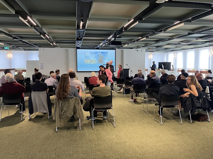 Audience in a seminar room looking towards the speaker and screen. Source: Australian National University