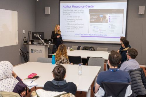 Dr Alison Taylor talks to the audience at the Optica workshop