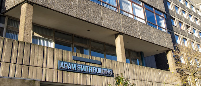 Adam Smith Building exterior with sign